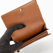 Shop this authentic Louis Vuitton Monogram Porte Tresor Wallet pre-loved on Labellov.com