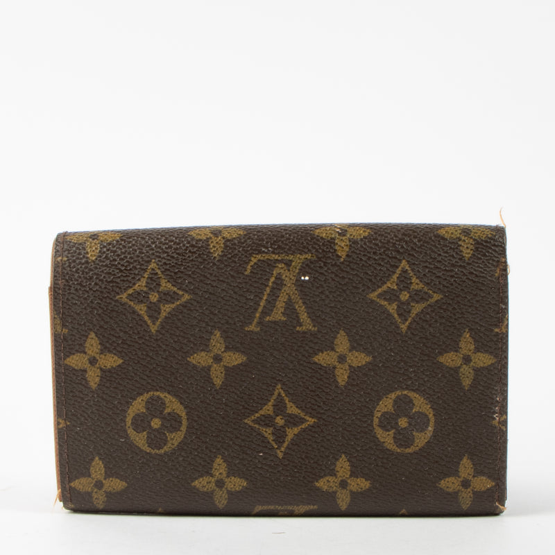 Shop this authentic Louis Vuitton Monogram Porte Tresor Wallet pre-loved on Labellov.com