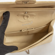 Shop the authentic Chanel Beige Lambskin Small Classic Bag second hand on Labellov.com!