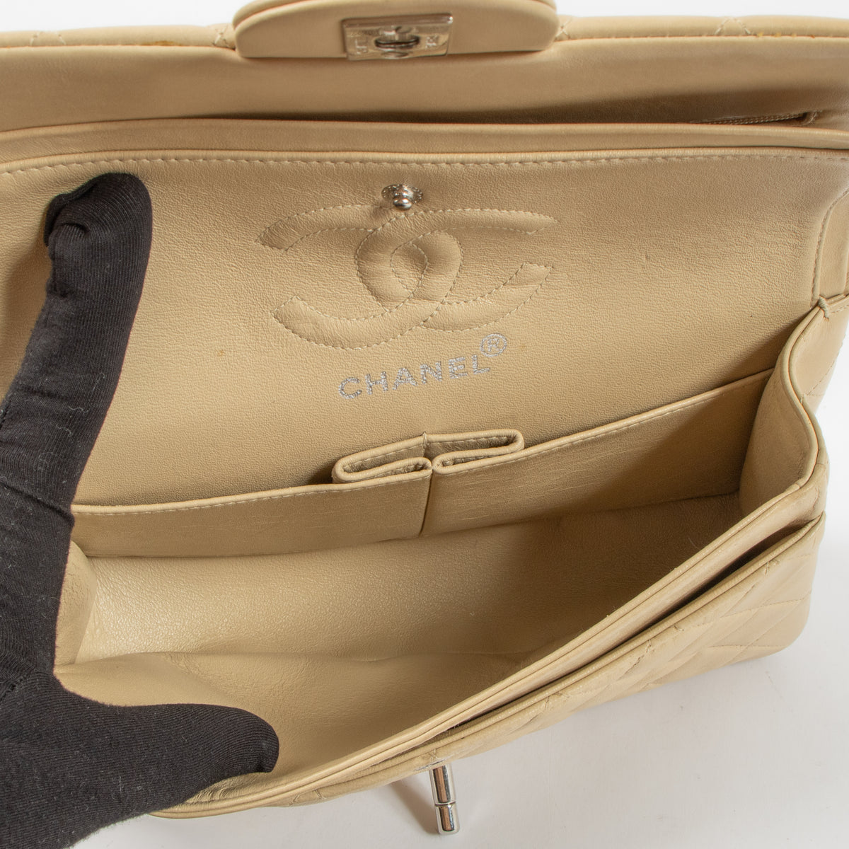 Shop the authentic Chanel Beige Lambskin Small Classic Bag second hand on Labellov.com!