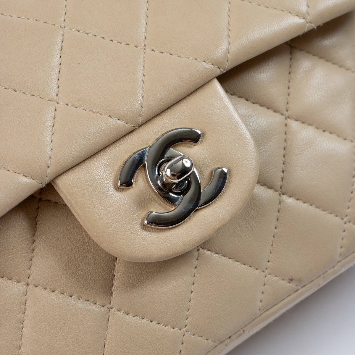 Shop the authentic Chanel Beige Lambskin Small Classic Bag second hand on Labellov.com!