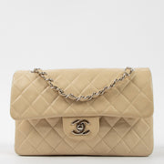 Shop the authentic Chanel Beige Lambskin Small Classic Bag second hand on Labellov.com!