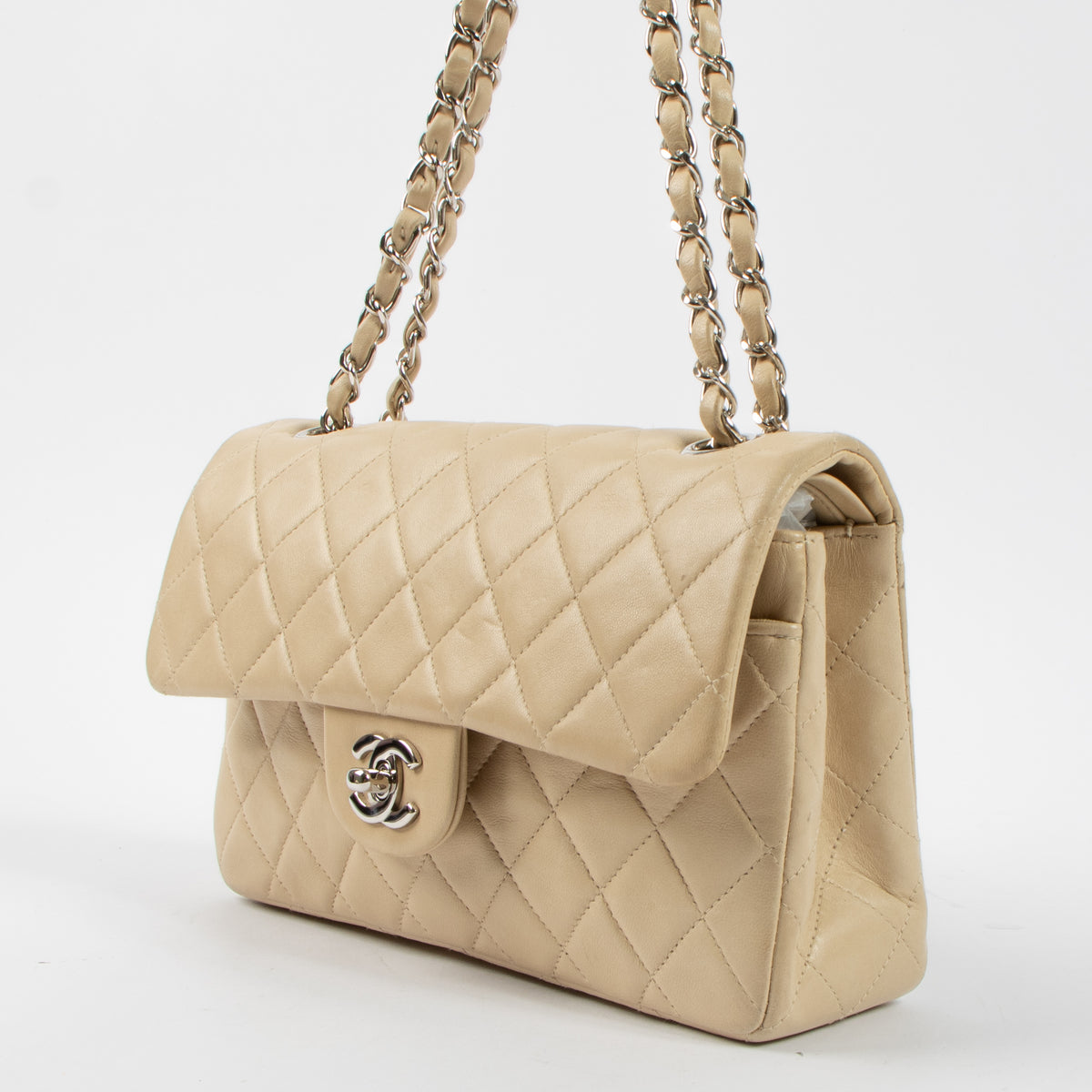 Shop the authentic Chanel Beige Lambskin Small Classic Bag second hand on Labellov.com!