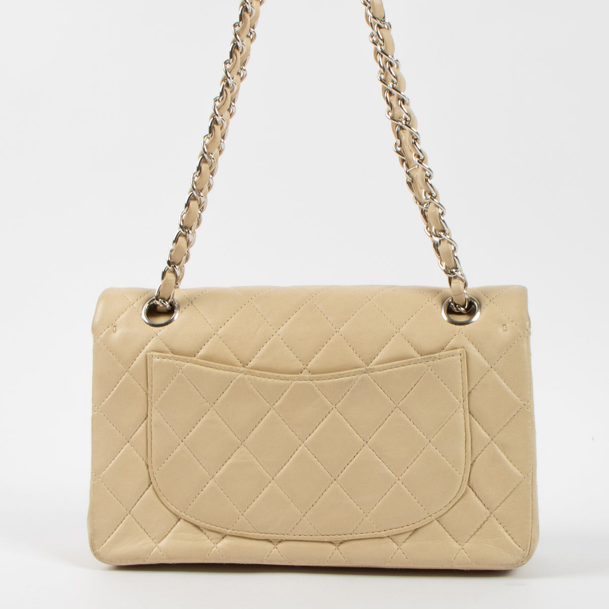 Shop the authentic Chanel Beige Lambskin Small Classic Bag second hand on Labellov.com!