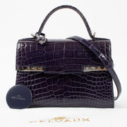 Shop the authentic Delvaux Indigo Shiny Alligator Tempete Mini Bag second hand on Labellov.com!