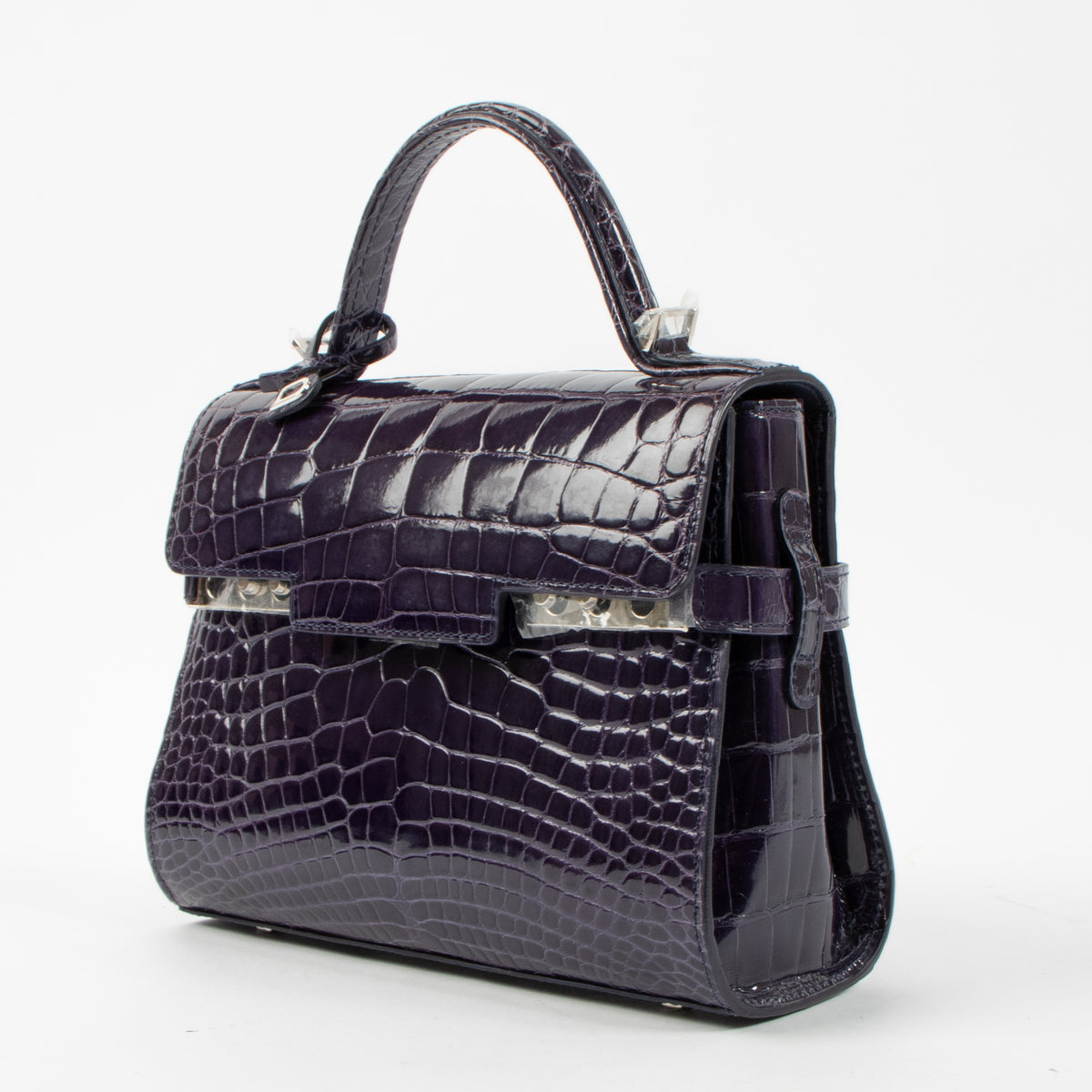 Shop the authentic Delvaux Indigo Shiny Alligator Tempete Mini Bag second hand on Labellov.com!
