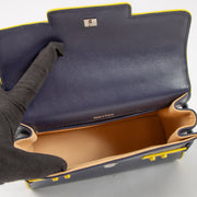Shop the authentic Delvaux Indigo/Safran Calf Souple Tempete Mini Illusion Bag second hand on Labellov.com!