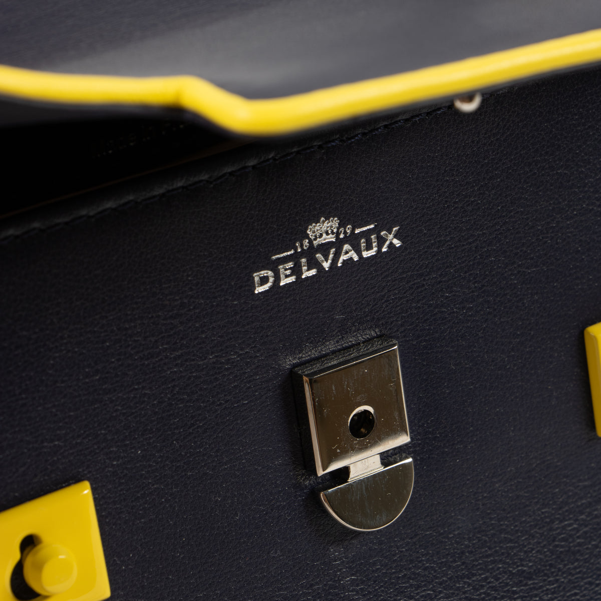 Shop the authentic Delvaux Indigo/Safran Calf Souple Tempete Mini Illusion Bag second hand on Labellov.com!