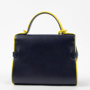Shop the authentic Delvaux Indigo/Safran Calf Souple Tempete Mini Illusion Bag second hand on Labellov.com!