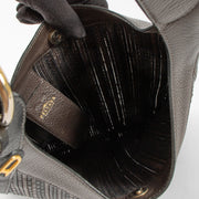 Shop the authentic Delvaux Brown Toile de Cuir Jongleur Bag second hand on Labellov.com!
