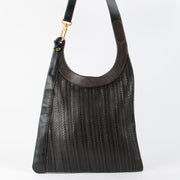 Shop the authentic Delvaux Brown Toile de Cuir Jongleur Bag second hand on Labellov.com!
