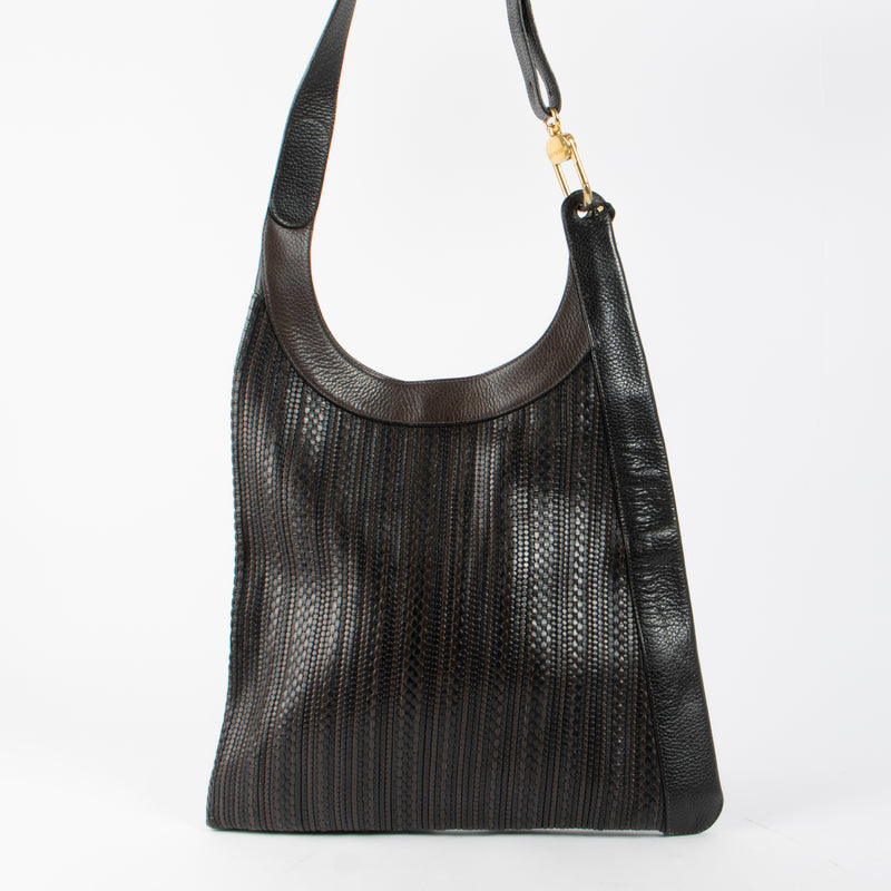 Shop the authentic Delvaux Brown Toile de Cuir Jongleur Bag second hand on Labellov.com!
