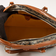 Shop this authentic Goyard Black/Tan Goyardine Saint Jeanne MM Bag Pre-loved on Labellov.com