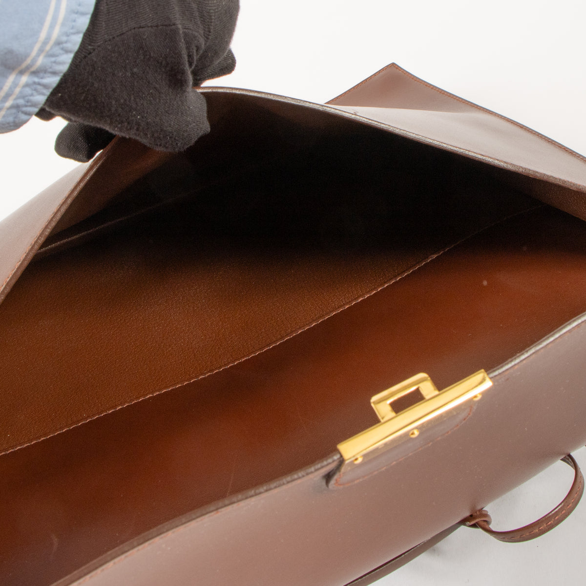 Shop this authentic luxury Hermes Quirus Briefcase Brown Box GHW pre-loved on Labellov. 