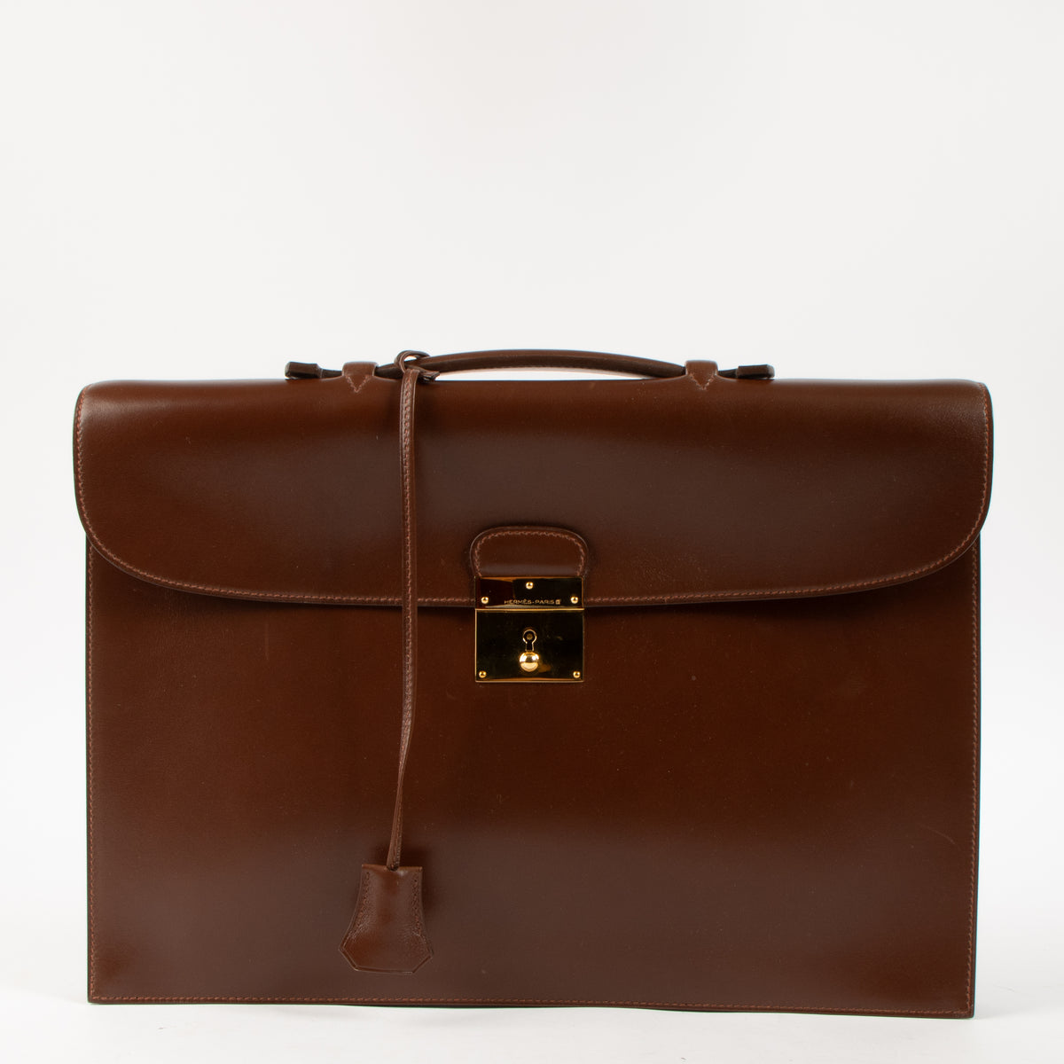 Shop this authentic luxury Hermes Quirus Briefcase Brown Box GHW pre-loved on Labellov. 