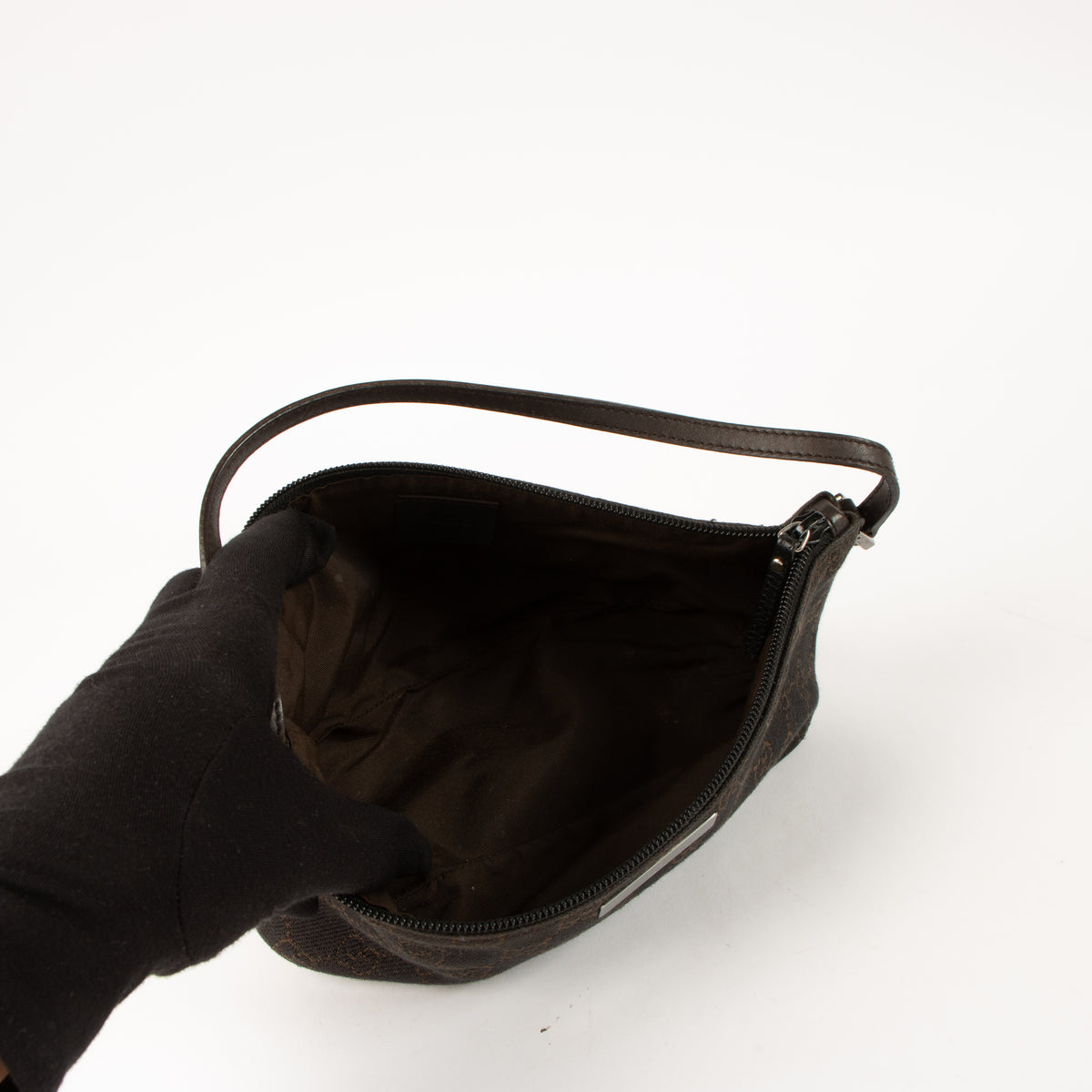 Shop this authentic Gucci Brown GG Denim Boat Bag pre-loved by Labellov.com