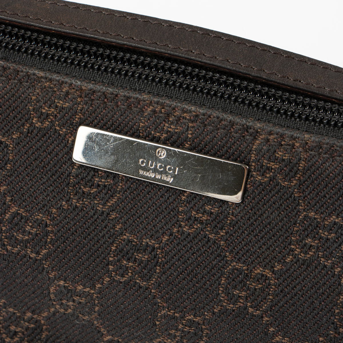 Shop this authentic Gucci Brown GG Denim Boat Bag pre-loved by Labellov.com