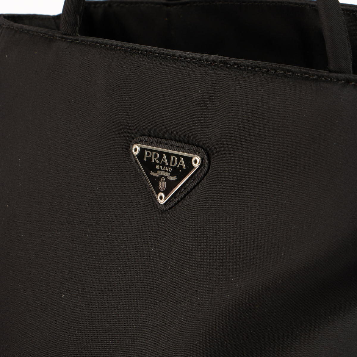 Shop this authentic Prada Black Nylon Small Tote Bag pr-loved by Labellov.com