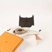 Shop this authentic Hermes Evelyne 16 Ebene Clemence Sangle Cavale GHW pre-loved on Labellov.com 