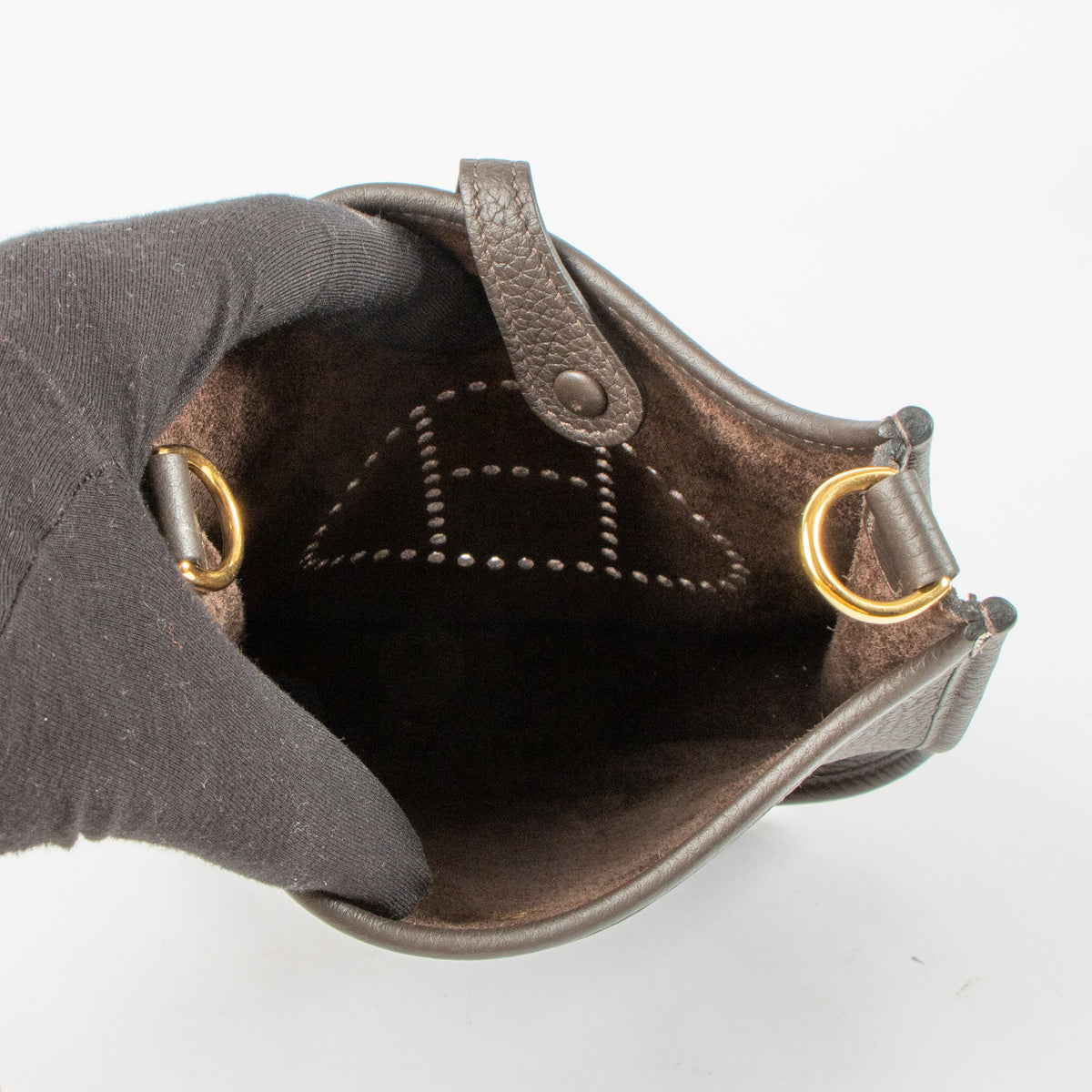 Shop this authentic Hermes Evelyne 16 Ebene Clemence Sangle Cavale GHW pre-loved on Labellov.com 