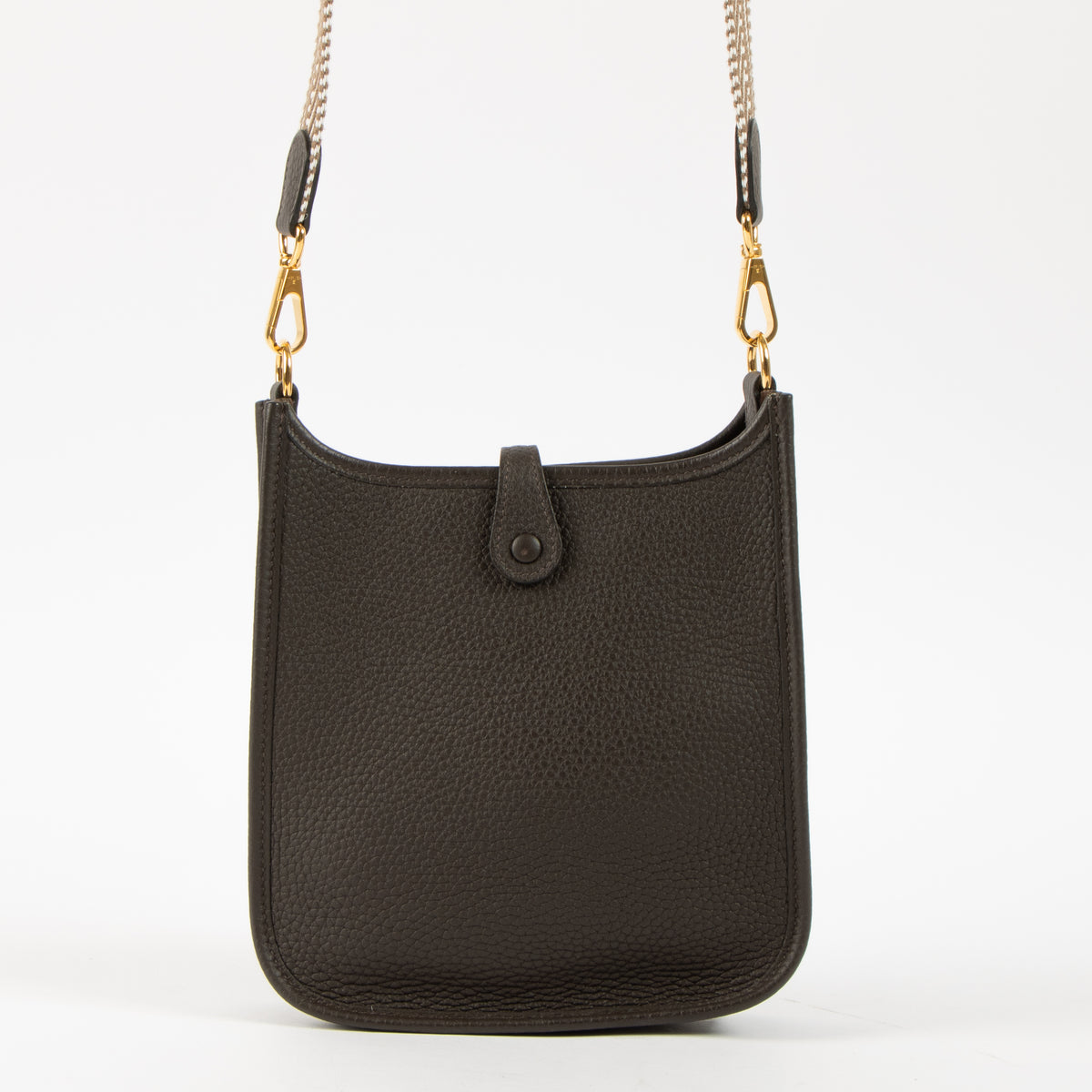 Shop this authentic Hermes Evelyne 16 Ebene Clemence Sangle Cavale GHW pre-loved on Labellov.com 