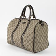 Shop this authentic Gucci Brown GG Supreme Medium Joy Boston Bag pre-loved on Labellov.com