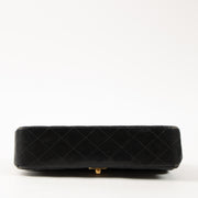 Shop this authentic Chanel Vintage Black Lambskin Medium Classic bag pre-loved on Labellov.com