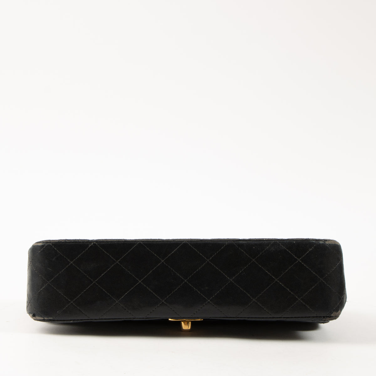 Shop this authentic Chanel Vintage Black Lambskin Medium Classic bag pre-loved on Labellov.com