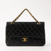 Shop this authentic Chanel Vintage Black Lambskin Medium Classic bag pre-loved on Labellov.com