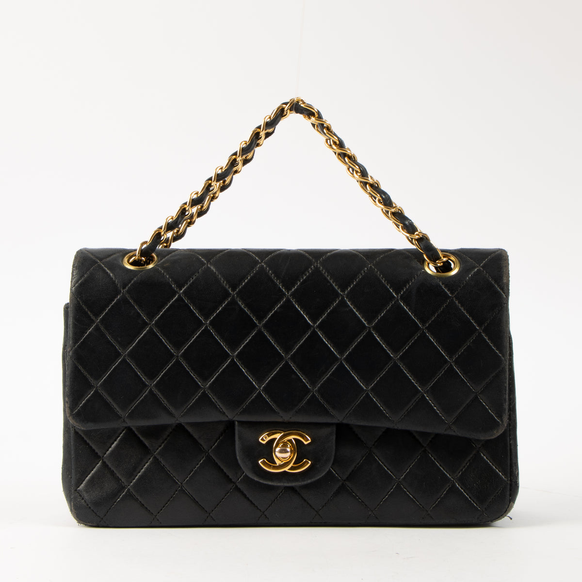 Shop this authentic Chanel Vintage Black Lambskin Medium Classic bag pre-loved on Labellov.com