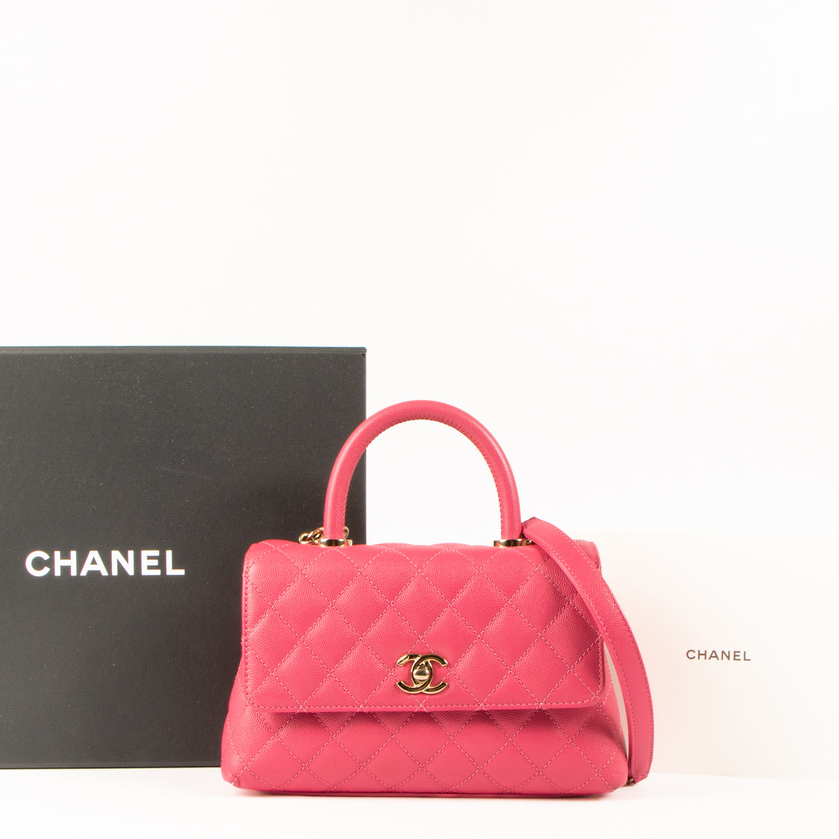 Shop this authentic Chanel Pink Caviar Small Coco Handle Bag pre-loved on Labellov.com