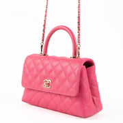 Shop this authentic Chanel Pink Caviar Small Coco Handle Bag pre-loved on Labellov.com