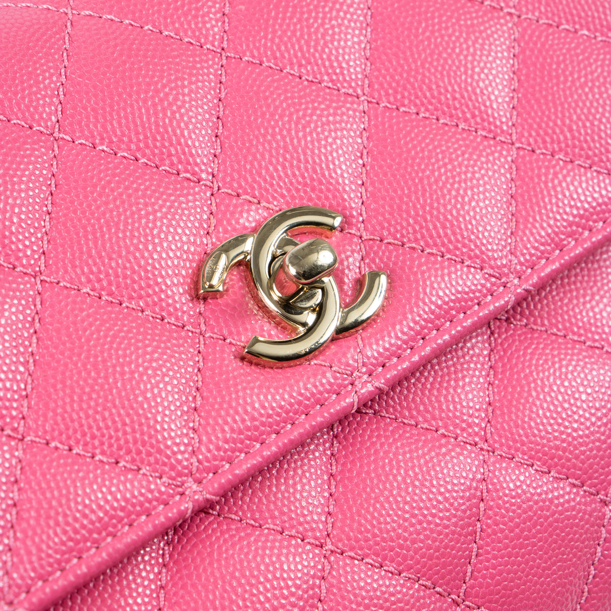 Shop this authentic Chanel Pink Caviar Small Coco Handle Bag pre-loved on Labellov.com