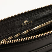 Shop the authentic Delvaux Black Louise Pochette Bag on Labellov.com.