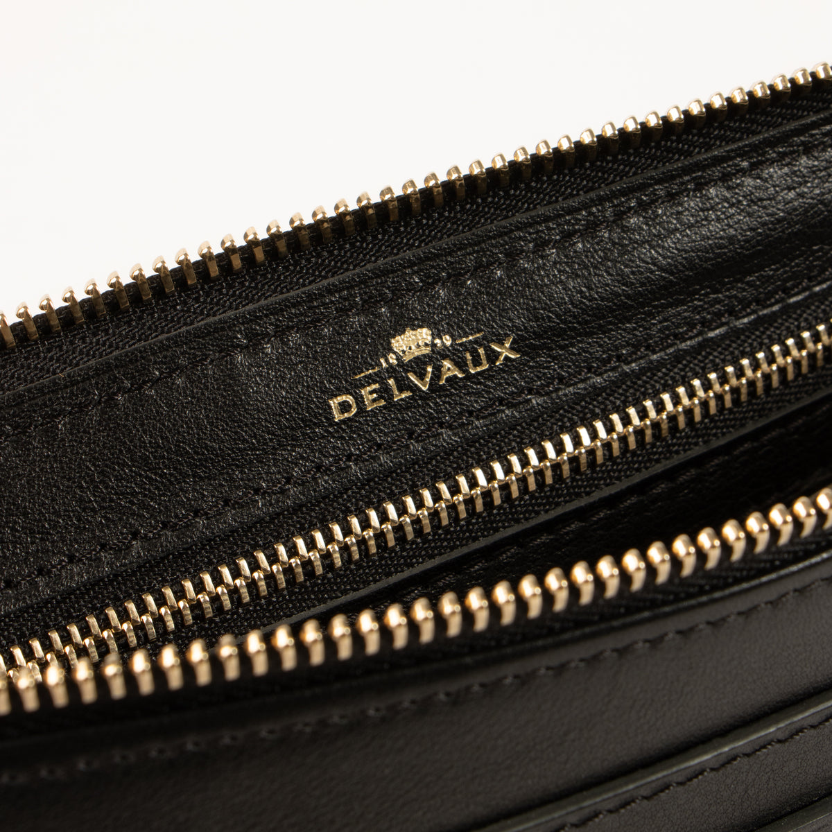 Shop the authentic Delvaux Black Louise Pochette Bag on Labellov.com.