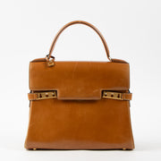 Shop this authentic Delvaux Cognac Box Calf Tempête MM Bag Pre-Loved on Labellov.com