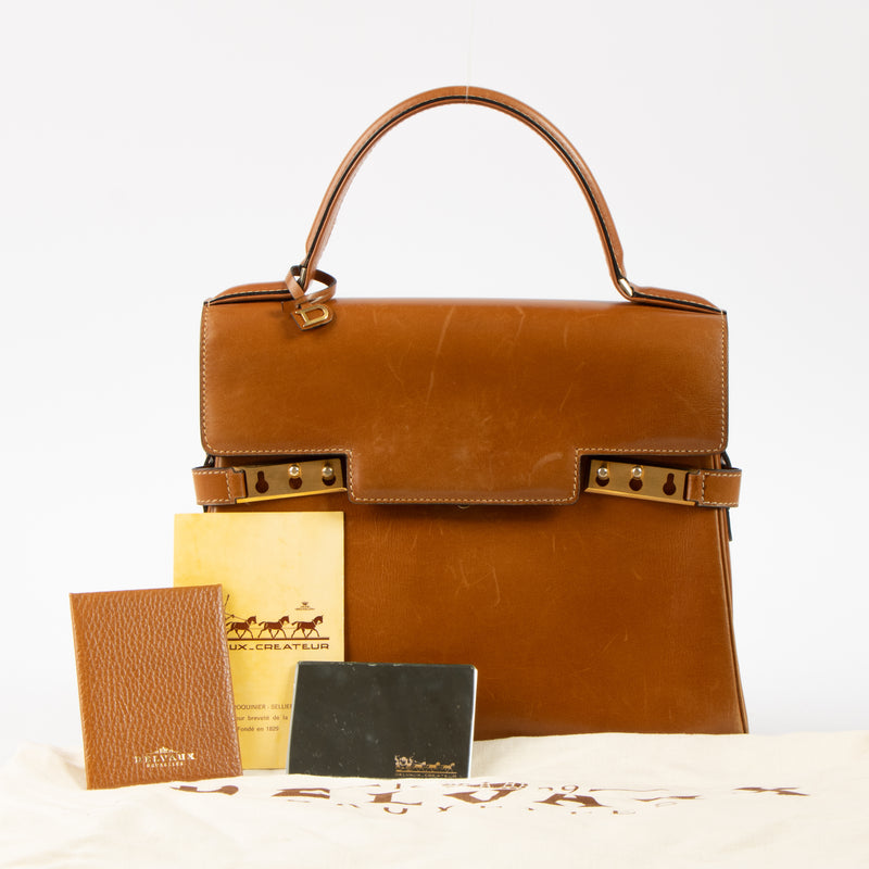 Shop this authentic Delvaux Cognac Box Calf Tempête MM Bag Pre-Loved on Labellov.com