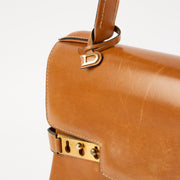 Shop this authentic Delvaux Cognac Box Calf Tempête MM Bag Pre-Loved on Labellov.com