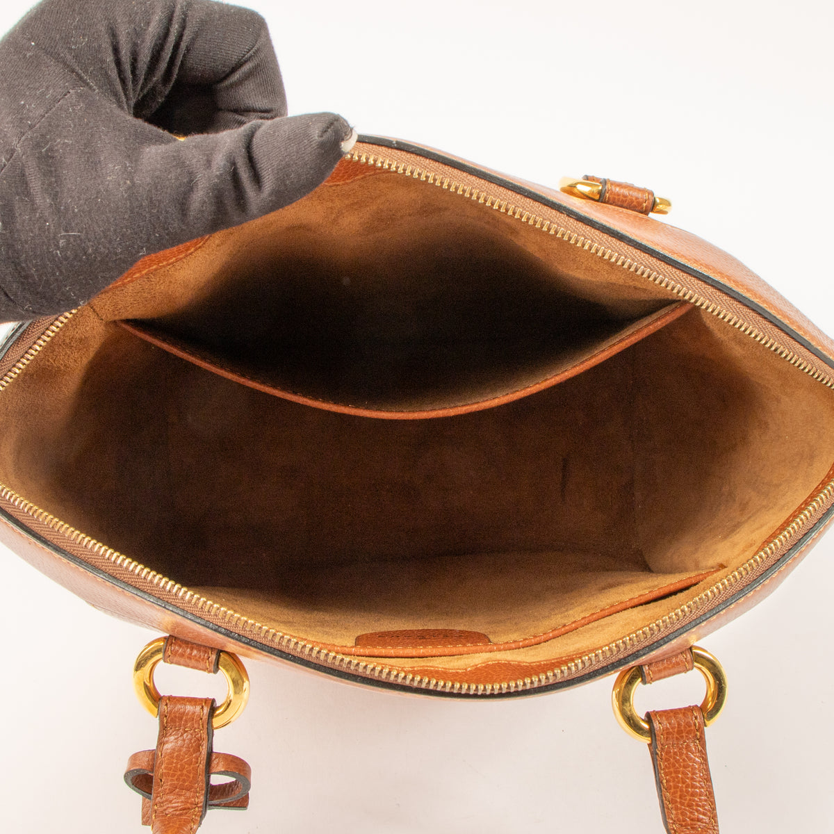 Shop this authentic Delvaux Cognac Jumping Charme Bag pre-loved on Labellov.com