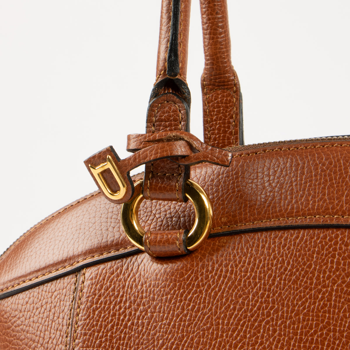 Shop this authentic Delvaux Cognac Jumping Charme Bag pre-loved on Labellov.com