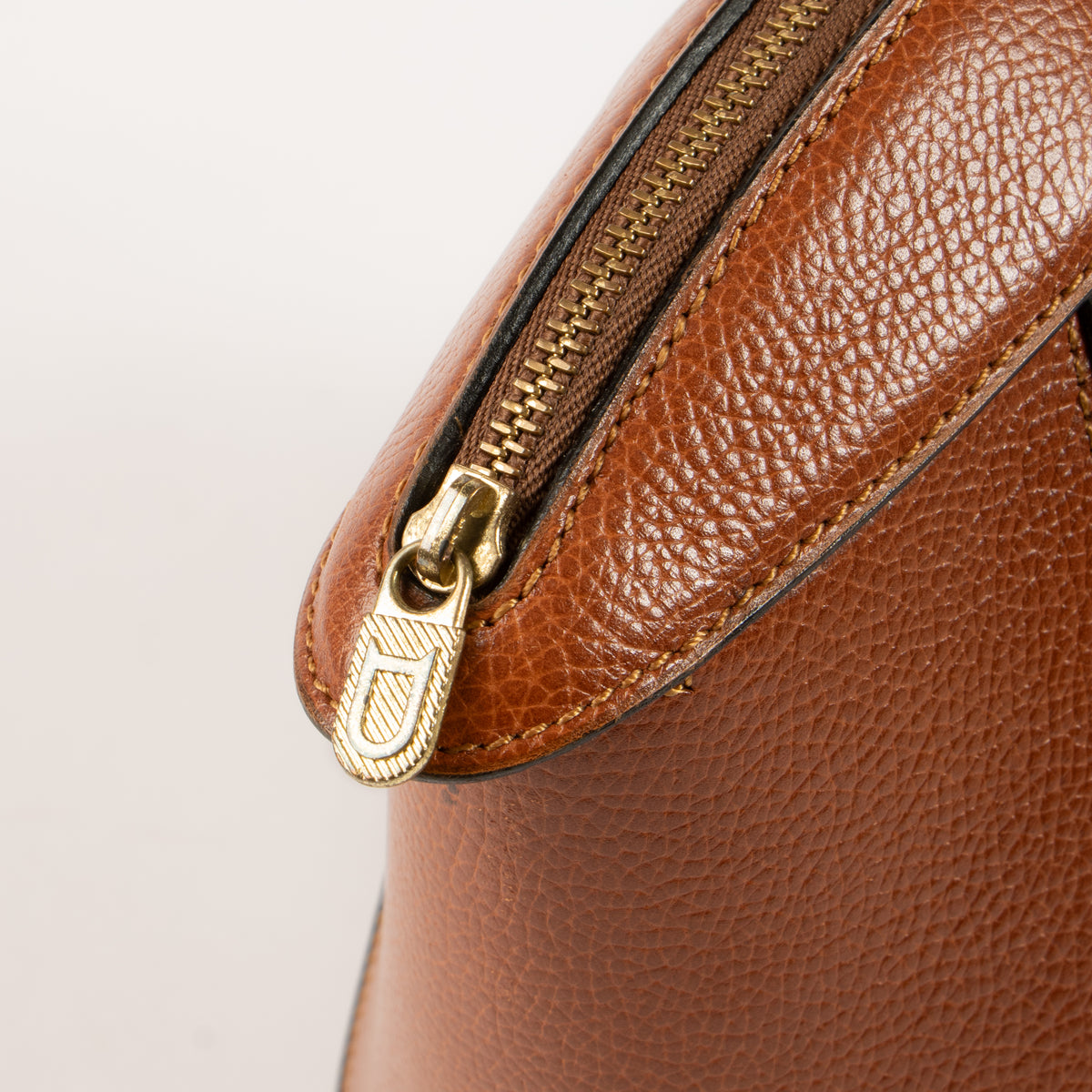 Shop this authentic Delvaux Cognac Jumping Charme Bag pre-loved on Labellov.com