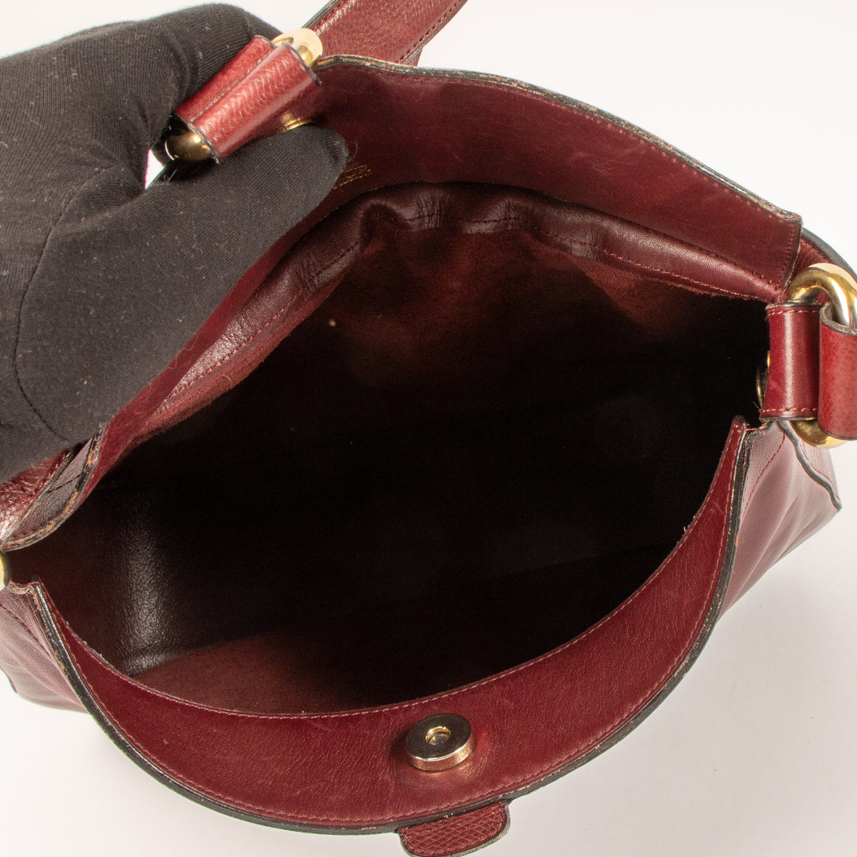 Shop this authenic Delvaux Vintage Burgundy Hobo Bag Pre-Loved on Labellov.com