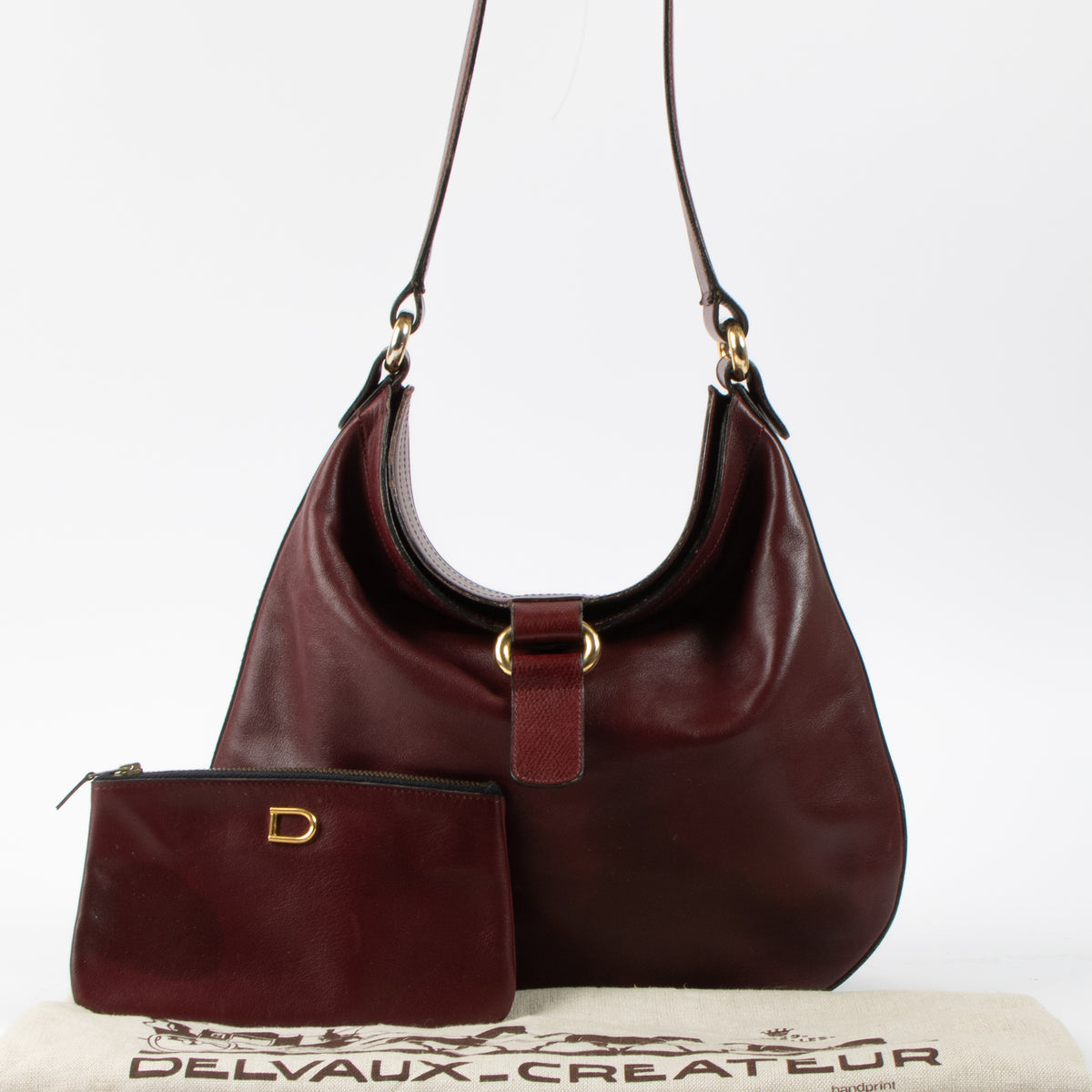 Shop this authenic Delvaux Vintage Burgundy Hobo Bag Pre-Loved on Labellov.com