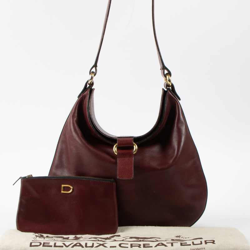Shop this authenic Delvaux Vintage Burgundy Hobo Bag Pre-Loved on Labellov.com