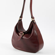 Shop this authenic Delvaux Vintage Burgundy Hobo Bag Pre-Loved on Labellov.com