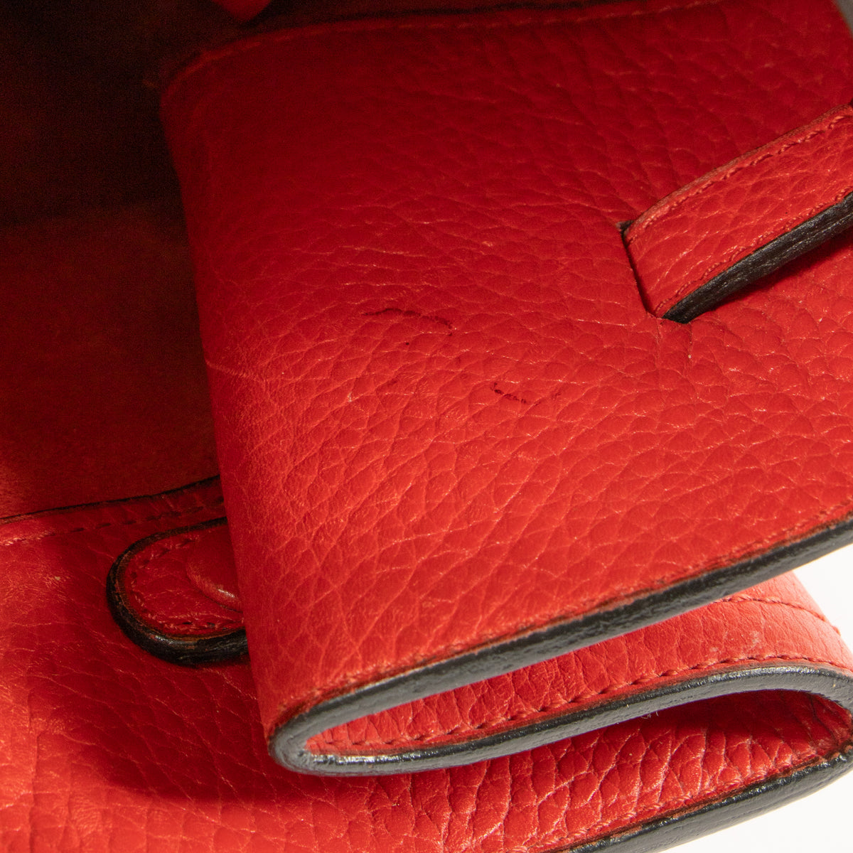 Shop this authentic Delvaux Red Nomade Shoulder Bag Pre-Loved on Labellov.com