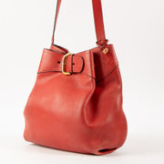 Shop this authentic Delvaux Red Nomade Shoulder Bag Pre-Loved on Labellov.com