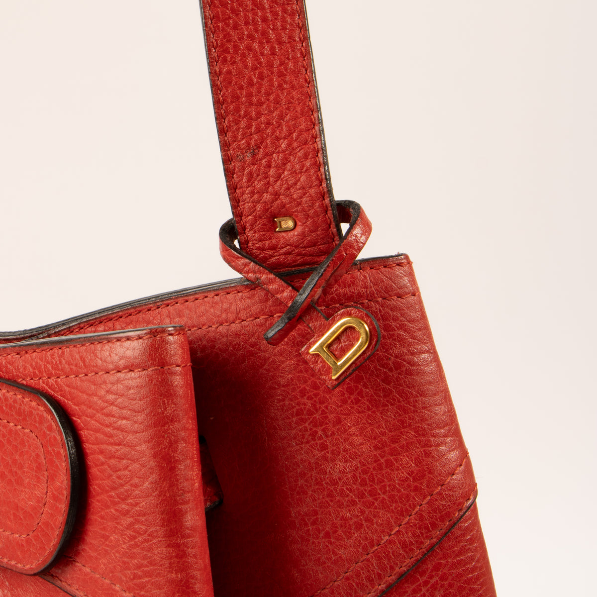 Shop this authentic Delvaux Red Nomade Shoulder Bag Pre-Loved on Labellov.com