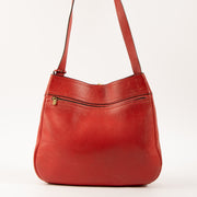 Shop this authentic Delvaux Red Nomade Shoulder Bag Pre-Loved on Labellov.com