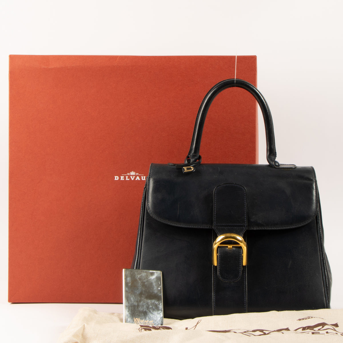 Shop this authentic Delvaux Vintage Blue Box Calf Brillant MM Bag Pre-Loved on Labellov.com